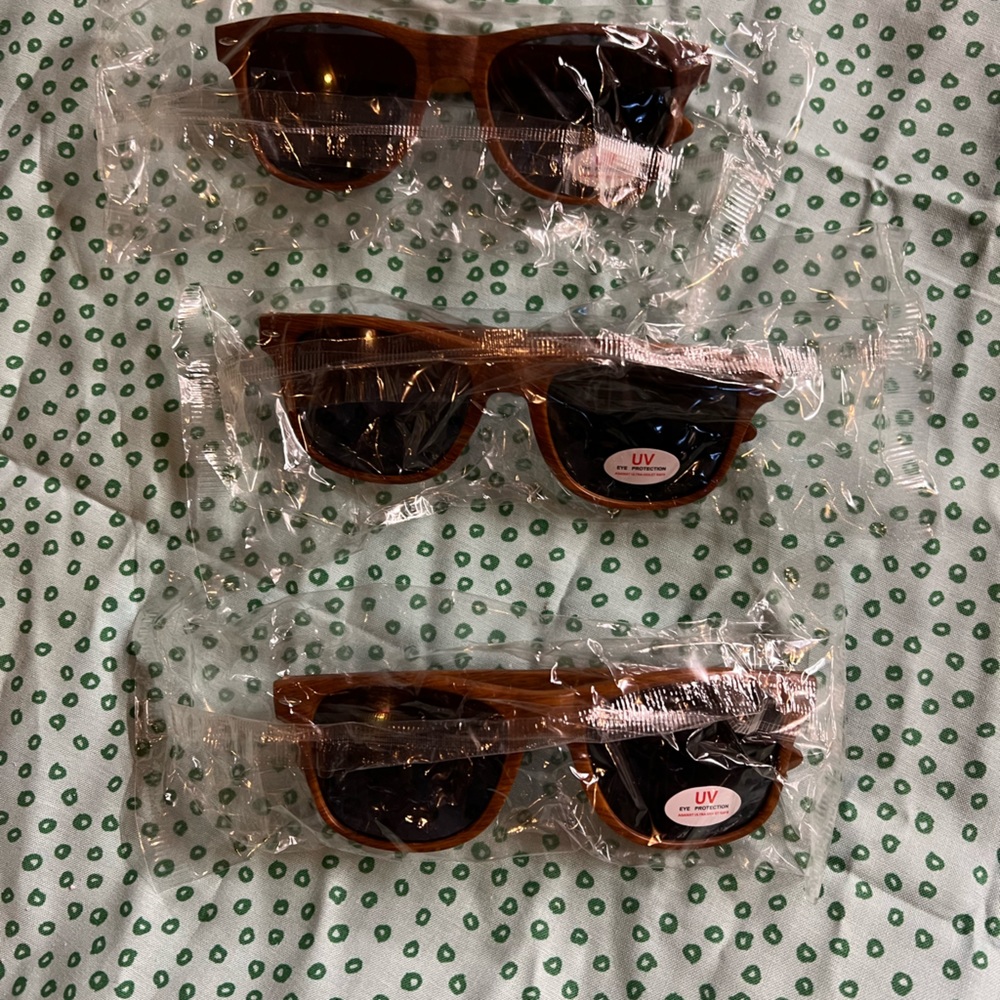 Three pairs of L.L. Bean sunglasses.